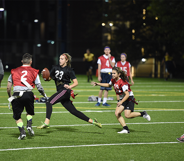 students playing flag football
